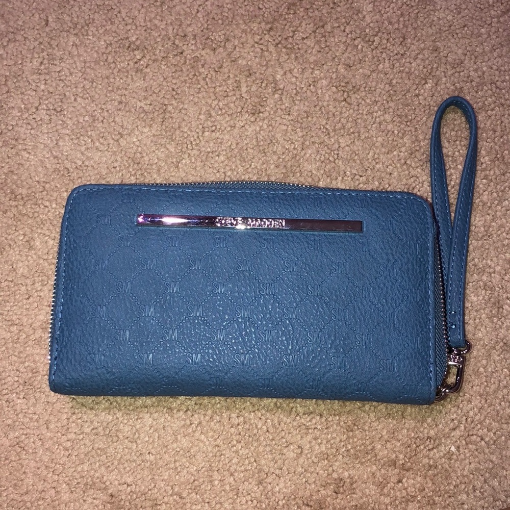 A blue Steve Madden wallet.